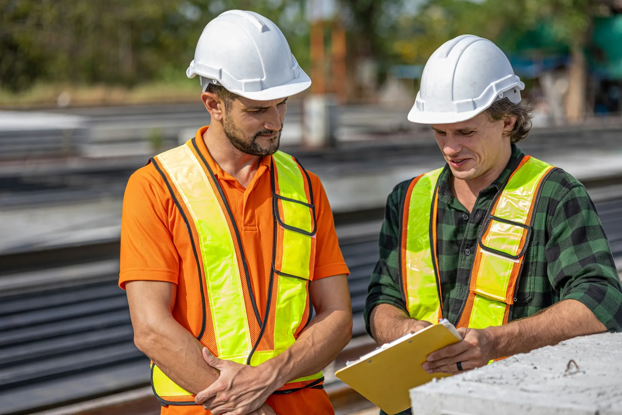 Quality supervisor reviewing project drawings